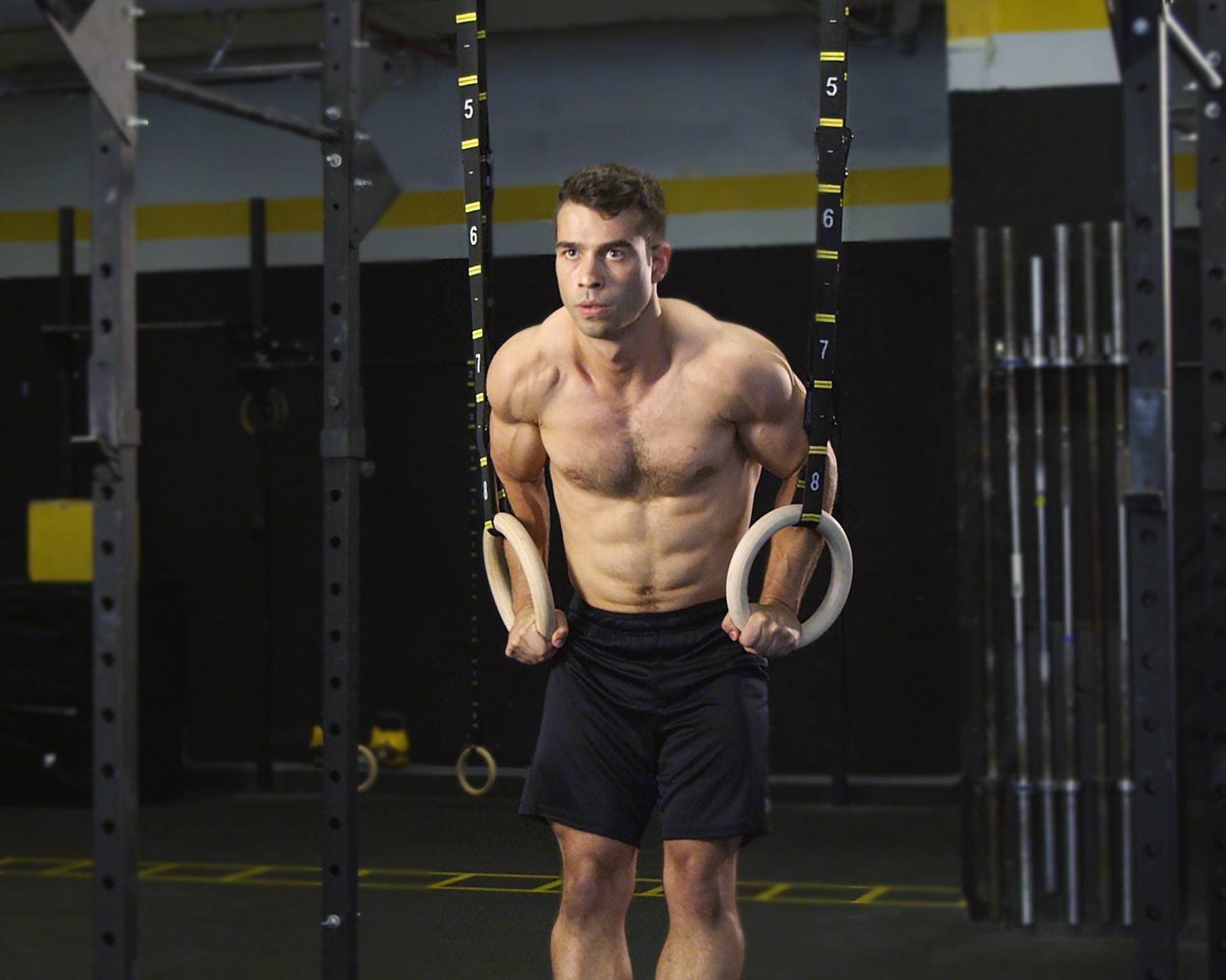 Athlete training on Double Circle gymnastic rings